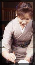 女将